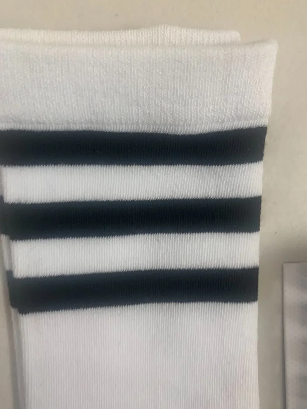 White Striped Socks and Checkered Hair Claw Clip